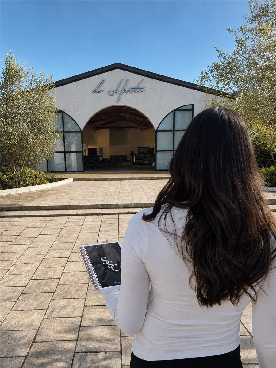 Planner with a run sheet on a venue walkthrough