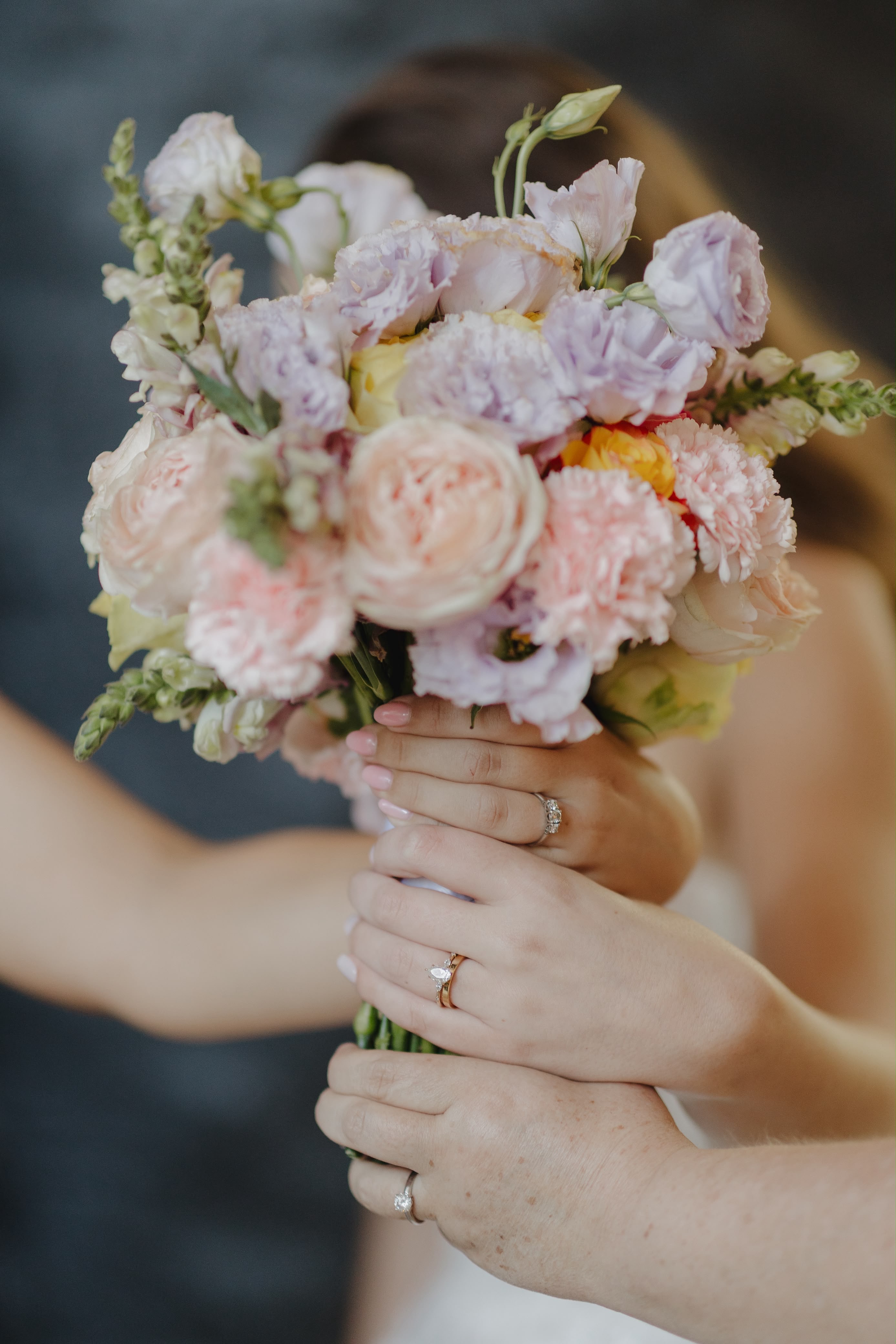 Pastel bridal bouquet of garden roses and lisianthus