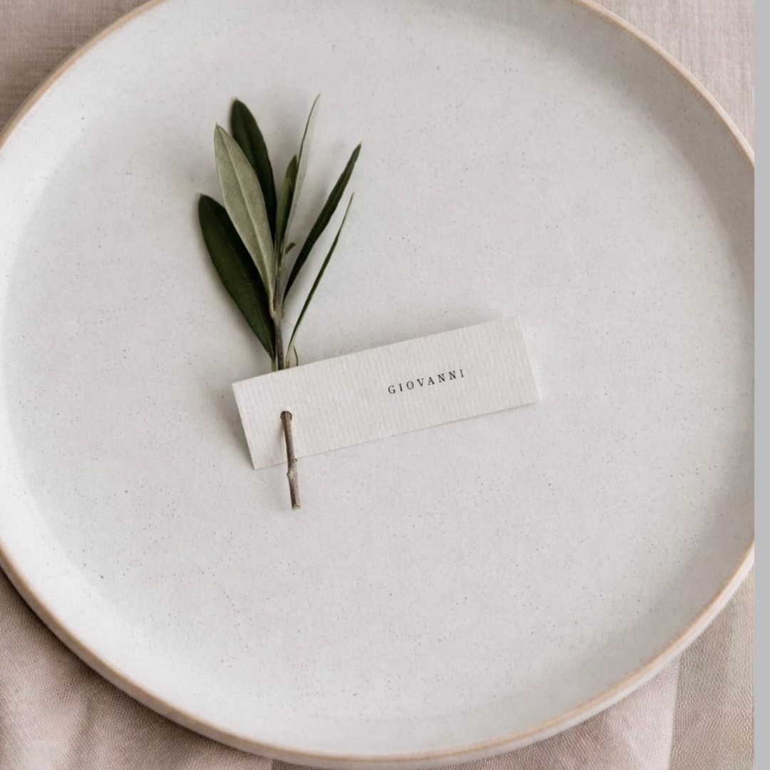 Name card with a dried floral insert