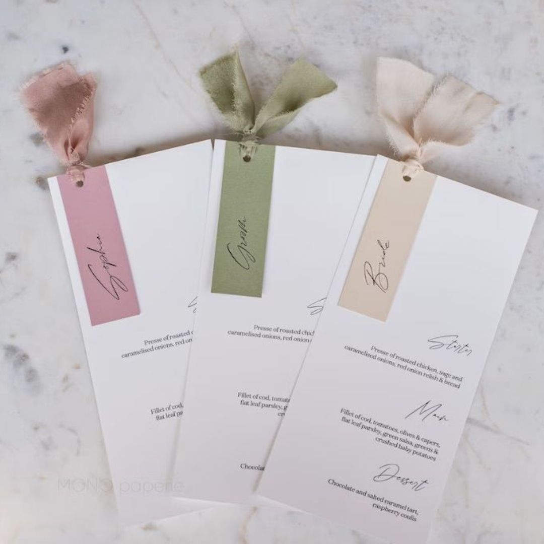Menu and name tag tied with ribbon