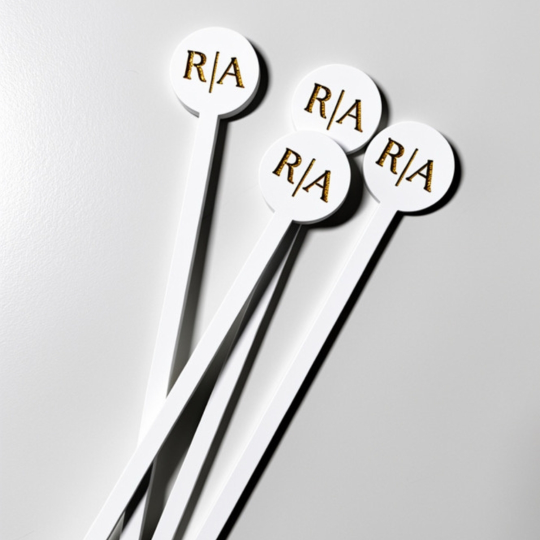 Paint-filled acrylic drink stirrers