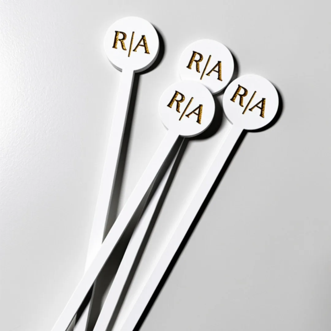Paint-filled acrylic drink stirrers