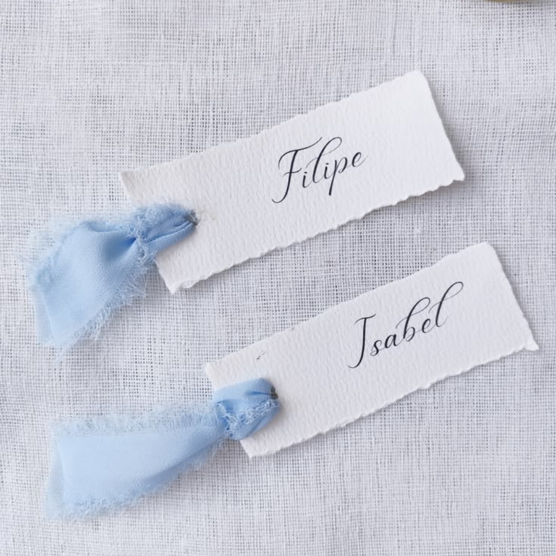 Name card tied with ribbon
