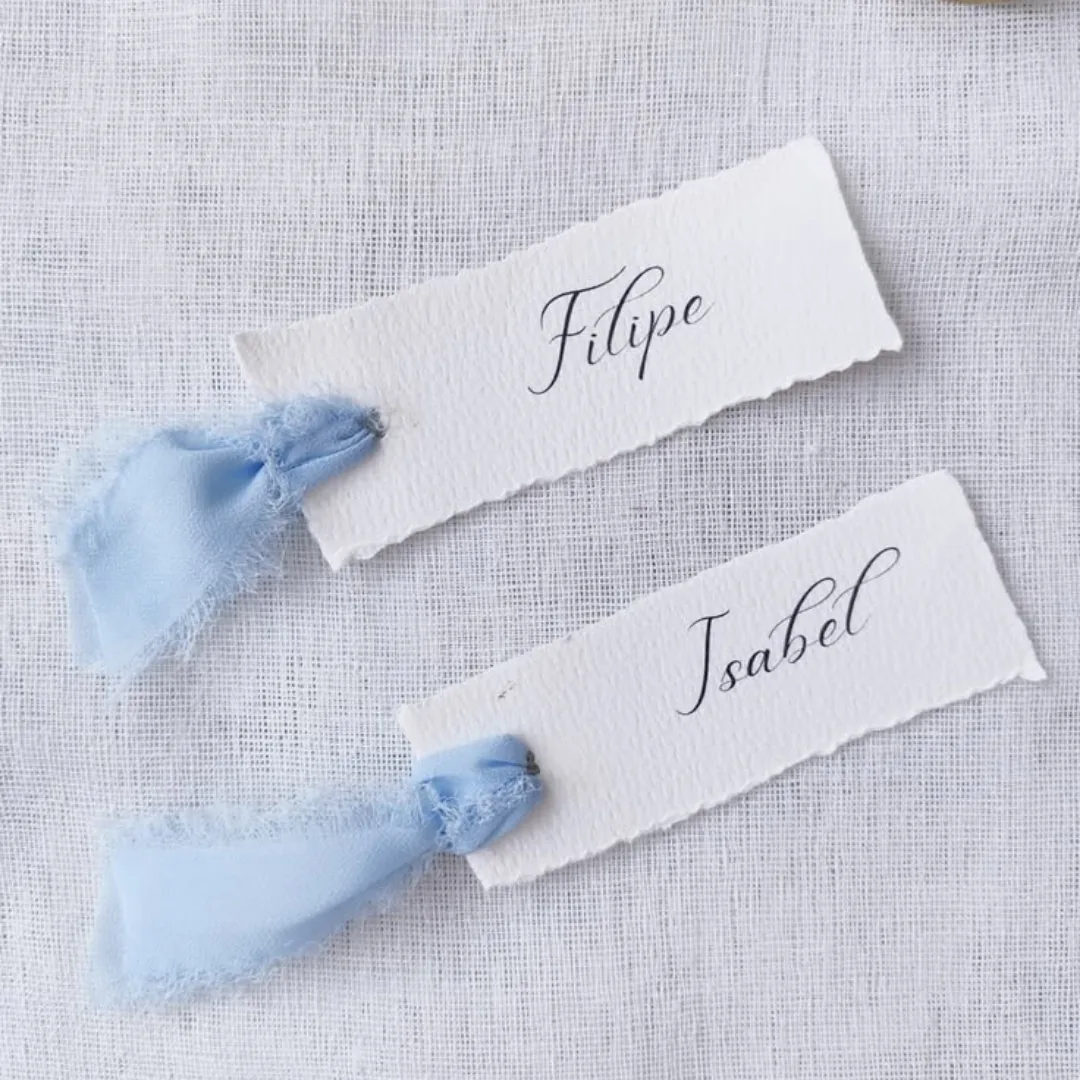 Name card tied with ribbon