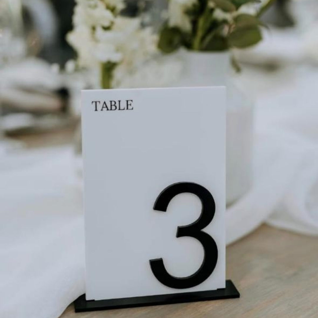 Black and white perspex table number