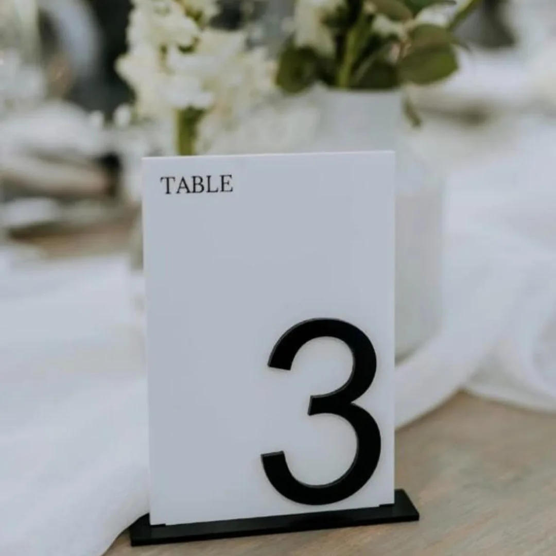 Black and white perspex table number