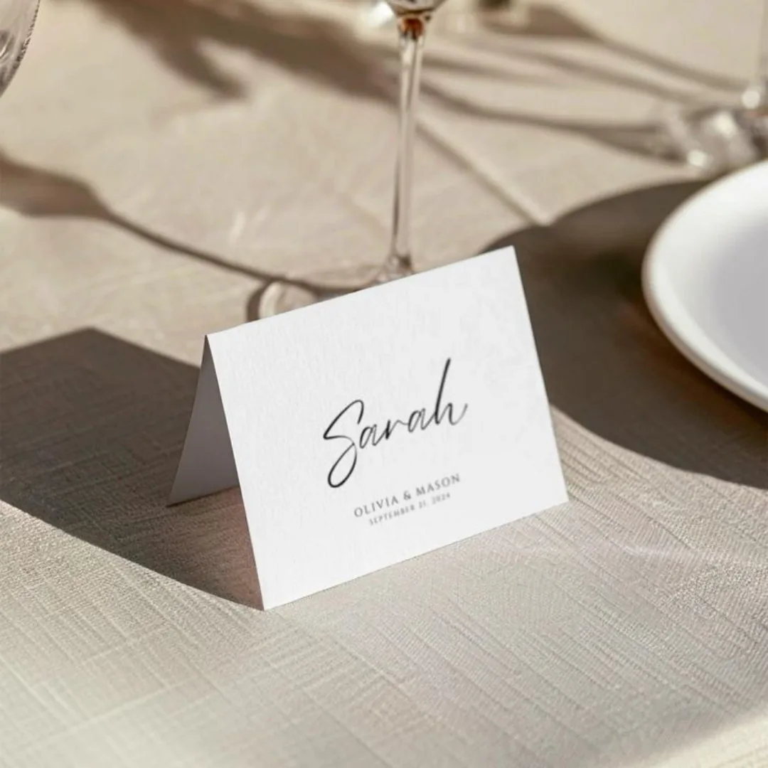 Folded tent name card at a place setting
